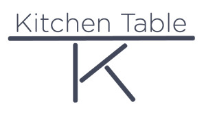 The K Table logo blue on white